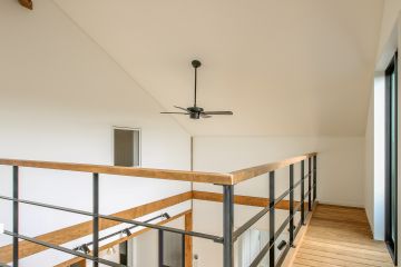 2階にいても1階の家族とコミュニケーションが取れる大きな吹抜け